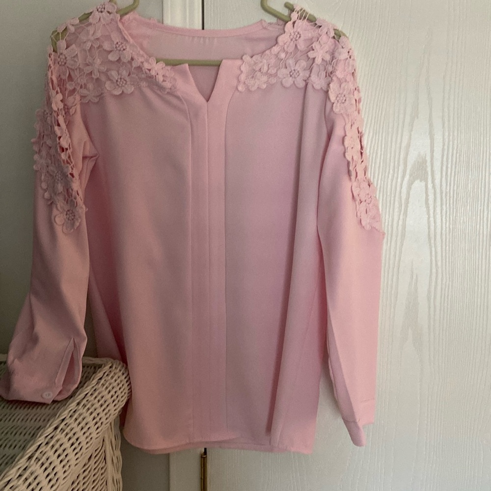 Beautiful pink blouse do not know the make size medium, but runs a little small